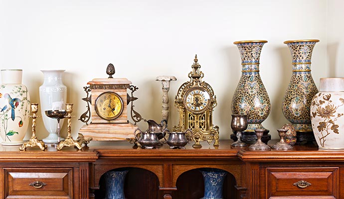 Restored antiques & home decor collection A collection of restored antique items displayed on a wooden table