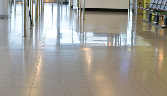 Clean public flooring in transit waiting area