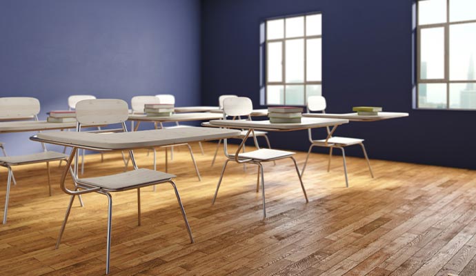Empty classroom with wooden floor