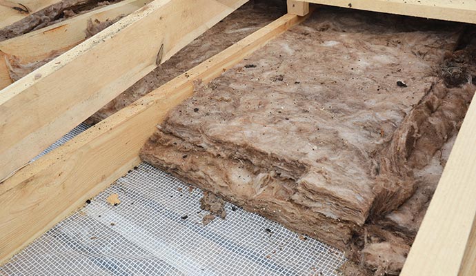 Old and dirty attic insulation
