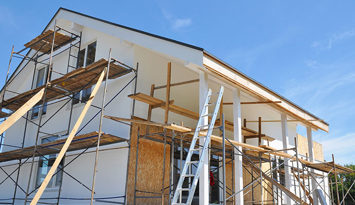 Residential house undergoing exterior reconstruction