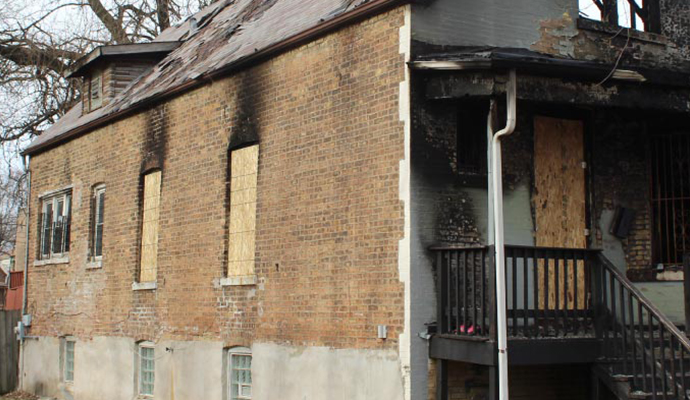 Fire damaged house board up services
