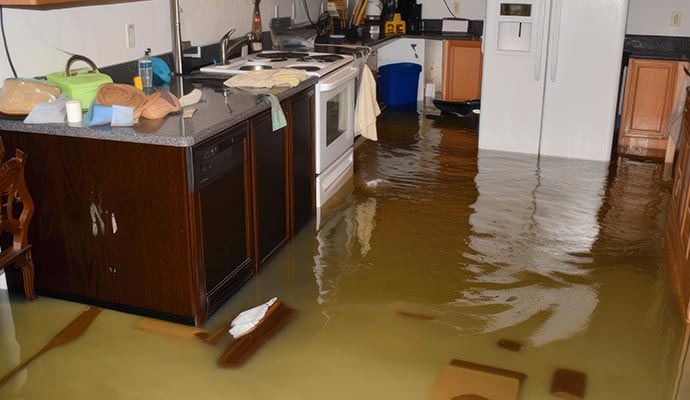 Standing water inside house after heavy flood