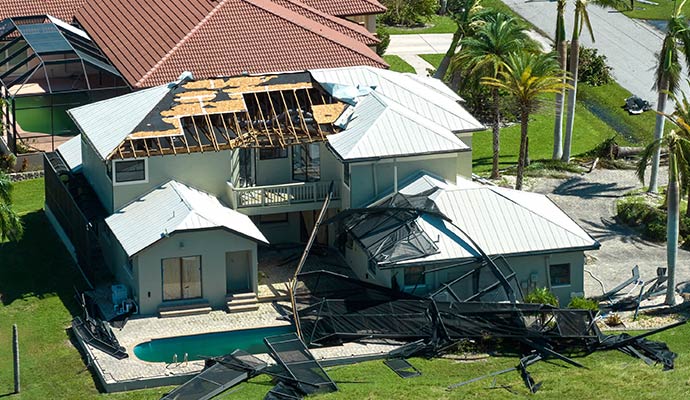 Severely damaged property due to storm