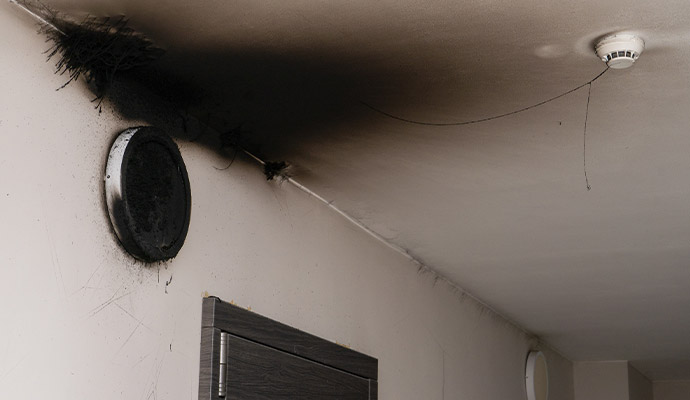 Soot damaged ceiling and roof