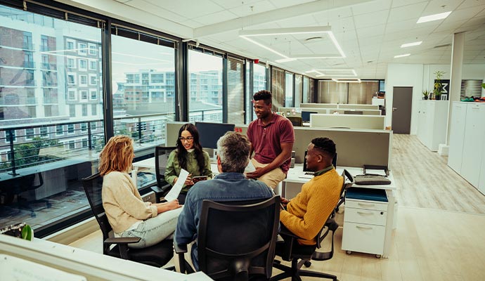Employees having discussion in clean commercial space Employees having discussion in clean commercial space