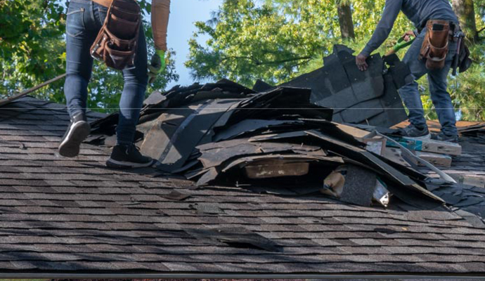 Wind damaged house roof