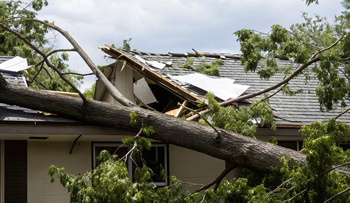Tornado damaged house roof