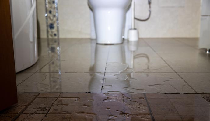 Water damaged bathroom floor